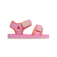 Pink and orange crywolf beach sandal with visible brand name on a white background