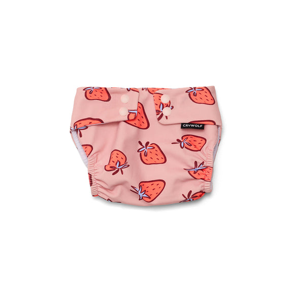 crywolf Pink swim nappy with strawberry pattern on a white background