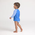 Child wearing crywolf  blue and white striped rash vest and board shorts on a white background