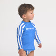 Child wearing a blue and white striped rash vest with 'CRYWOLF' branding on a light gray background