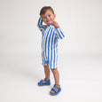 Child wearing a crywolf blue and white striped swimsuit on a white background