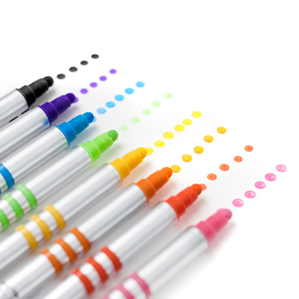 Set of colorful markers with colored caps on a white background