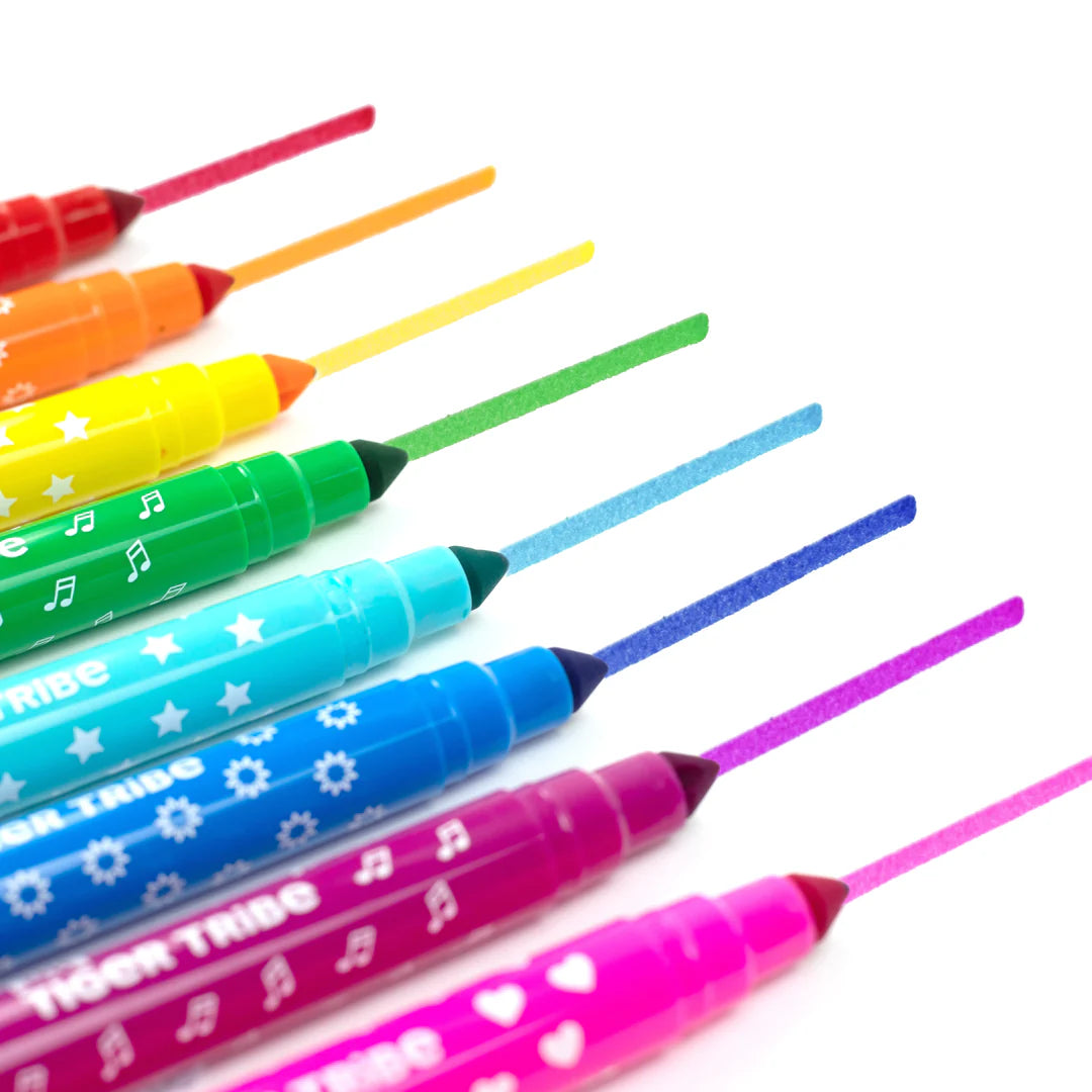 Set of colorful markers with patterned caps on a white background