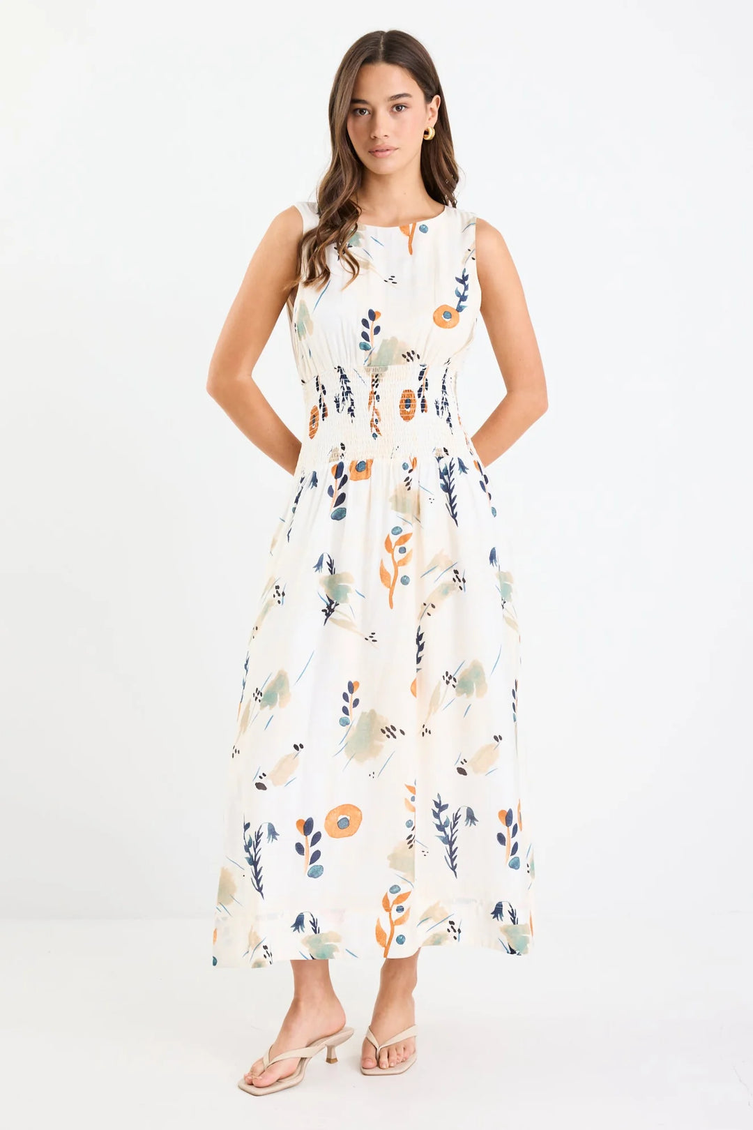 Woman wearing a floral dress on a white background