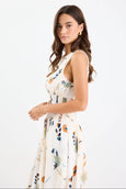 Woman wearing a floral dress on a white background