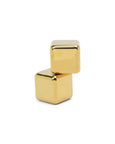 Two gold cubes stacked on a white background