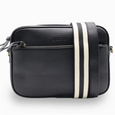 Black leather crossbody bag with a white stripe on a white background