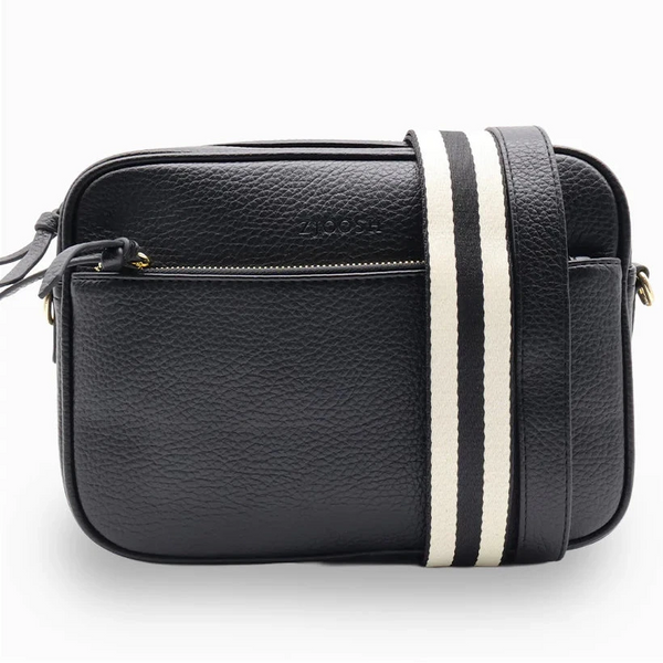 Black leather crossbody bag with a white stripe on a white background