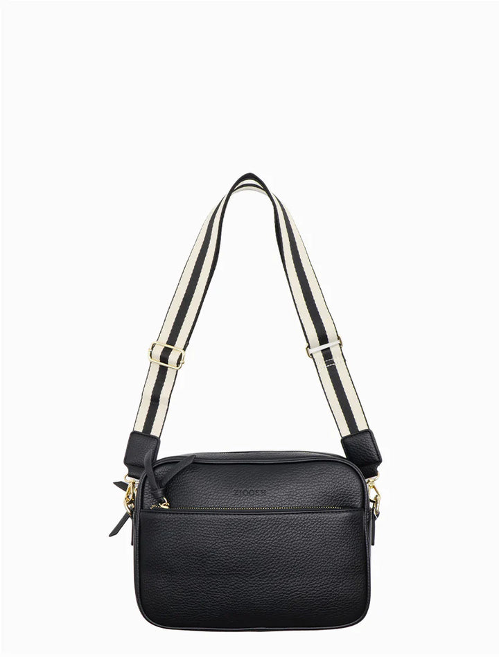 Black handbag with a shoulder strap on a white background