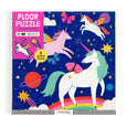 Floor puzzle packaging with unicorns and space-themed design on a blue background