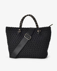 Black woven handbag with a floral patterned handle on a white background