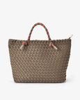 Woven handbag with braided handles on a white background