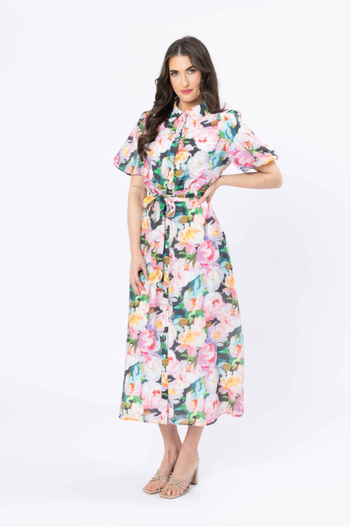Woman wearing a floral dress on a white background