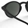 Black sunglasses with dark lenses on a white background