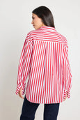 Woman wearing a red and white striped shirt on a plain background