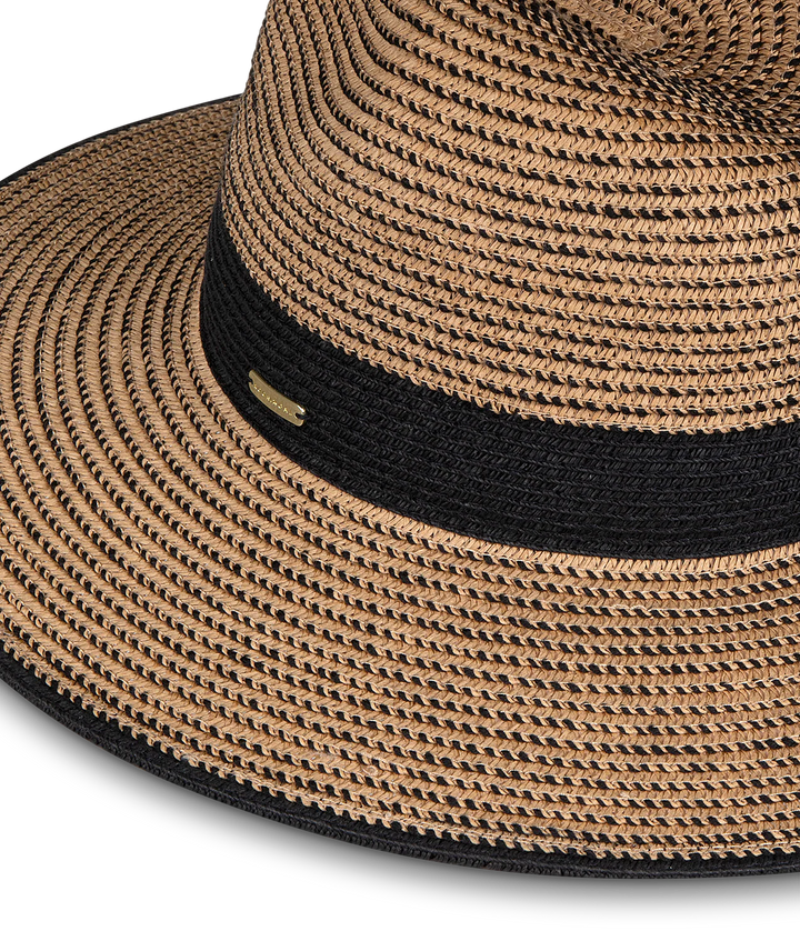 Beige straw hat with black rim on a white background