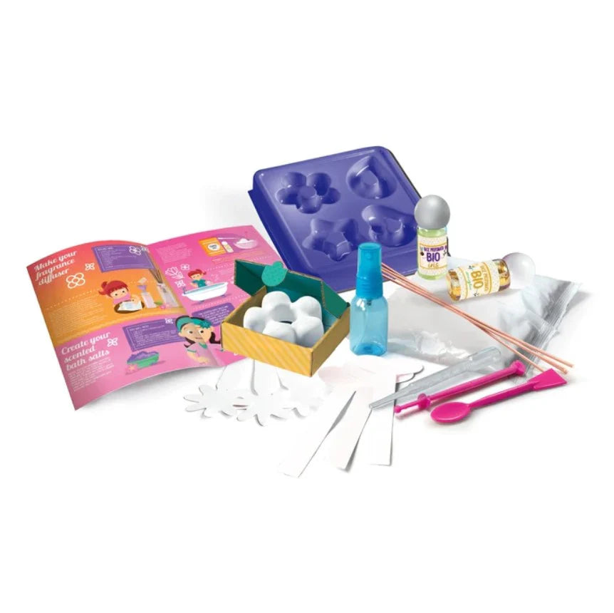 Children's craft kit with tools and materials on a white background