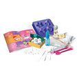 Children's craft kit with tools and materials on a white background