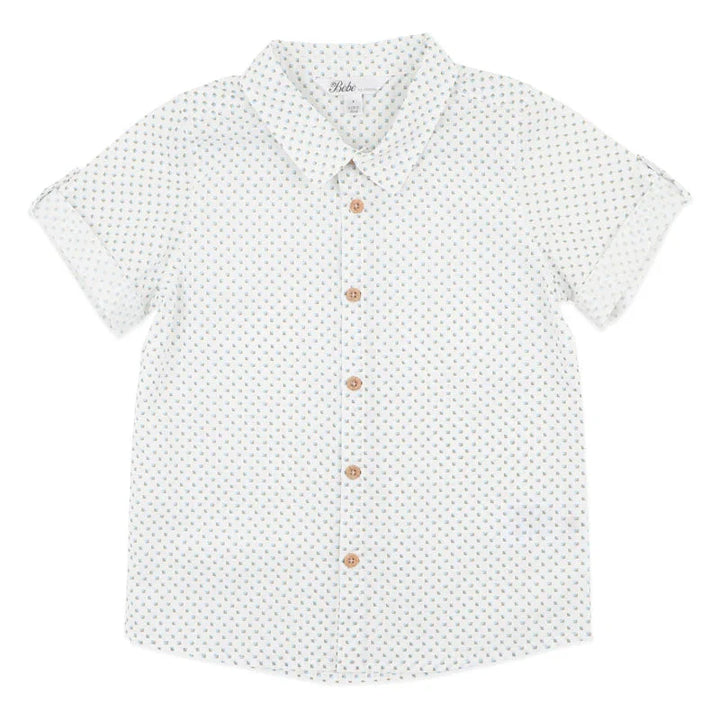 Bebe White shirt with small pattern and brown buttons on a white background