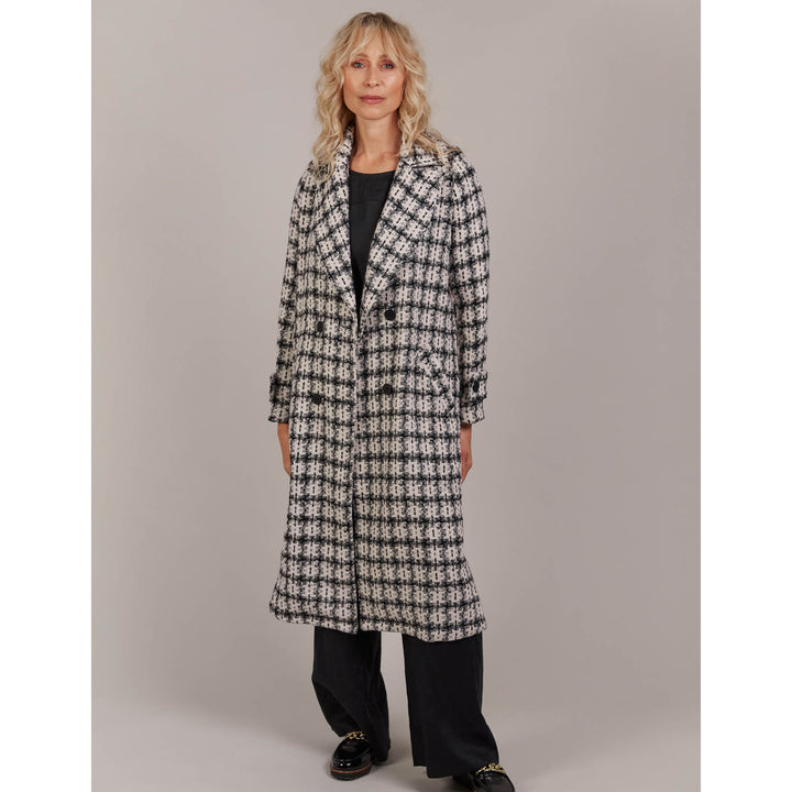 Discover refined winter styling with the Aman Coat, your ultimate companion for a polished, sophisticated look. Available from www.thecollectivenz.com 