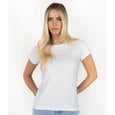 Woman wearing a plain white t-shirt against a white background