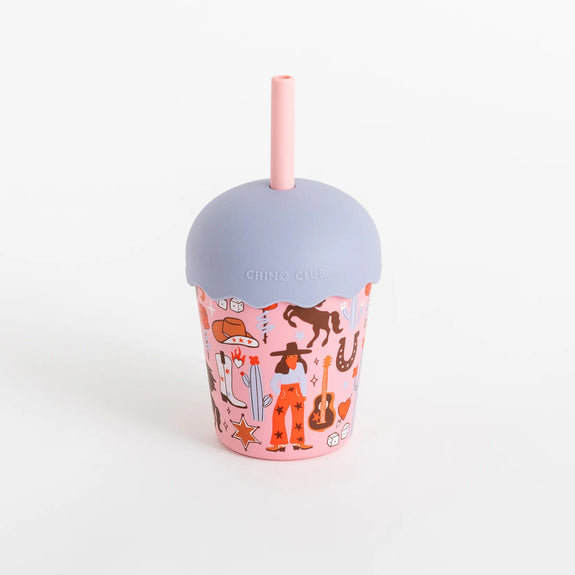 Pink tumbler with a pattern, gray lid, and pink straw on a white background