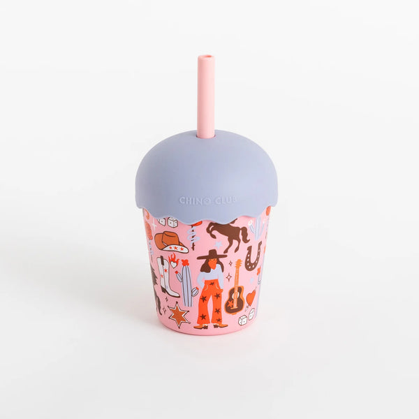 Pink tumbler with a pattern, gray lid, and pink straw on a white background