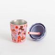 Children's stainless steel cup with colorful design and matching lid on a white background