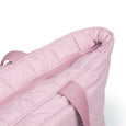 Close-up of a pink quilted bag with a zipper on a white background