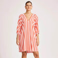 Woman wearing a eb  ive  red and white striped dress on a plain background