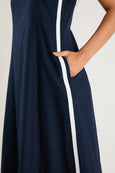 Navy dress with a white stripe on a plain background