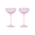 Two pink cocktail glasses on a white background