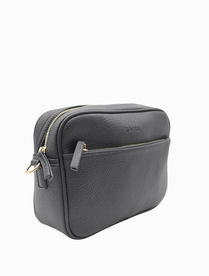Gray leather crossbody bag with gold zipper on a white background