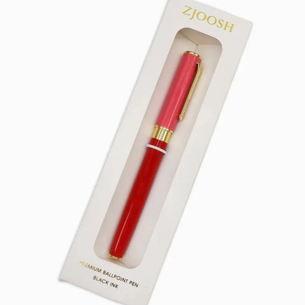 Red ballpoint pen with gold accents in a Zajoosh branded box on a white background