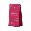 Pink tea bag packaging with 'Gut Feelings' text on a white background