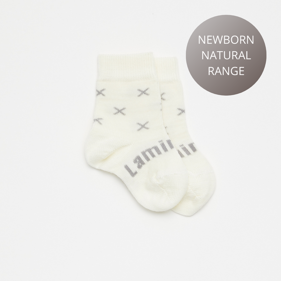 Fox - Natural with grey crosses crew length merino socks (*0-3m grey is a bit darker than in photo's)  An essential item for every new baby. Merino wool is super soft and cosy on a baby’s delicate skin. The Newborn Naturals range comes in our three smallest sizes.   * PLEASE NOTE If your baby is over 9 Months in age we recommend going up to the Age 1-2  New Zealand Made, 70% Merino wool, sizes knitted into every pair so no confusion over whose are whose!