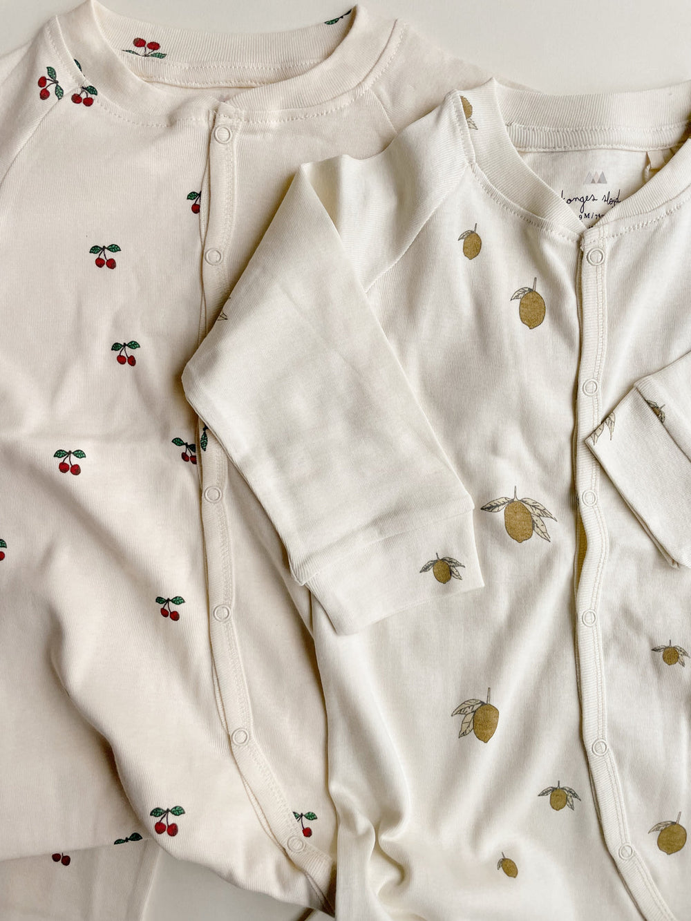 Konges Slojd cherry sleepy onesie available from www.thecollectivenz.com